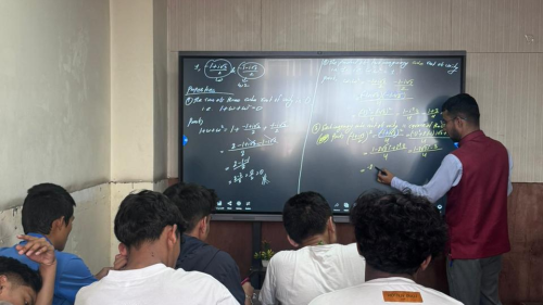 Teacher of Scholars Gyan Academy Teaching Maths Class.